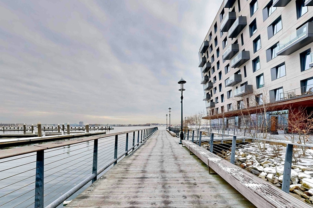 300 Pier 4 Blvd., Unit 6E Boston, MA 02210 - Photo 33 of 36 a view of balcony with wooden floor