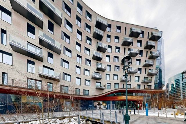 a view of a backyard with sitting area