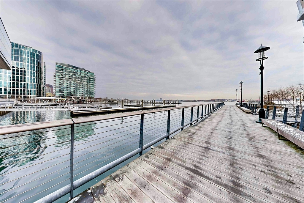 300 Pier 4 Blvd., Unit 6E Boston, MA 02210 - Photo 36 of 36 a view of entryway and hall with wooden floor