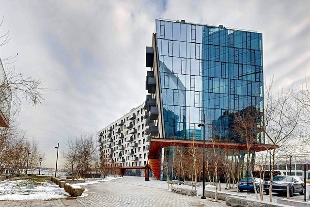 a view of a city with tall buildings