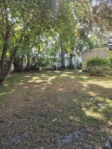 a view of outdoor space and yard