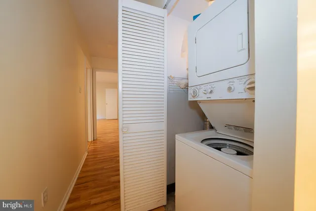 a view of storage and utility room with washer and dryer