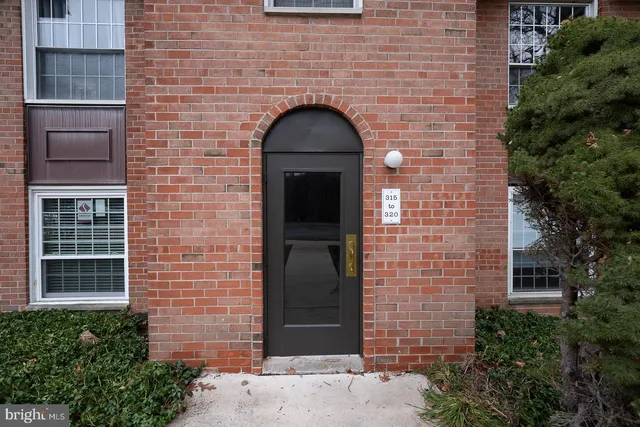 a view of a brick house with a window