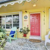a potted plant sitting in front of a door