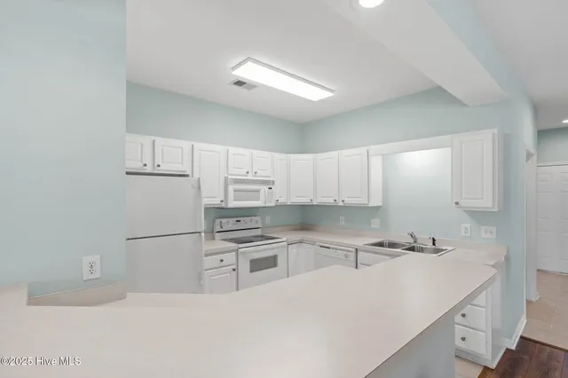 $299,900 | 126 Rice Mill Circle, Unit 1, Sunset Beach, NC 28468