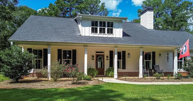 front view of a house with a yard