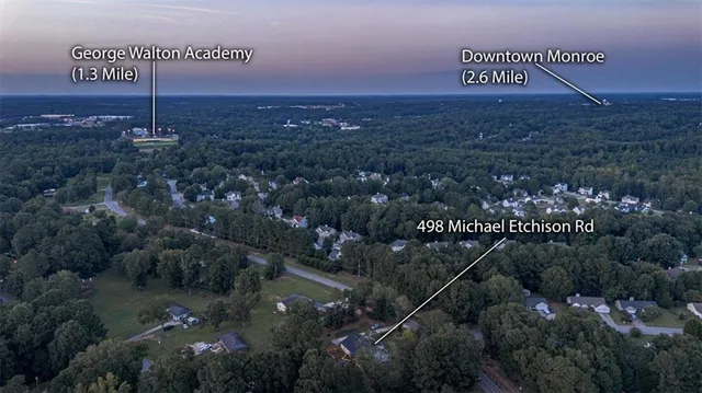 a view of a livingroom with furniture and front door