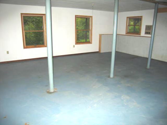 49 Stebbins Road Otis, MA 01253 - Photo 8 of 8 an empty room with a window
