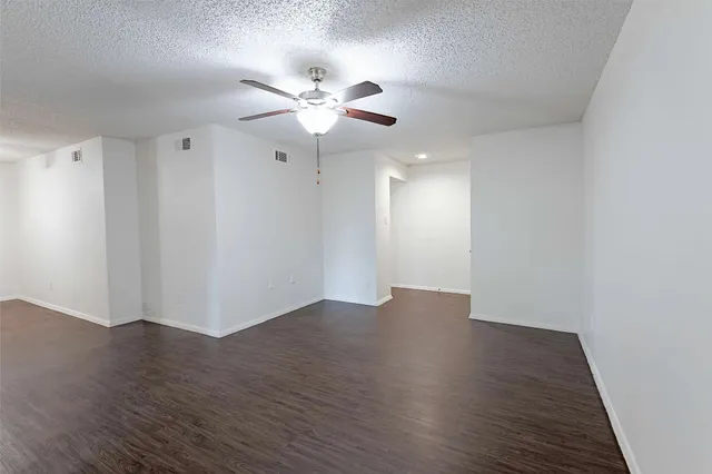 a view of a porch with wooden floor and outdoor space