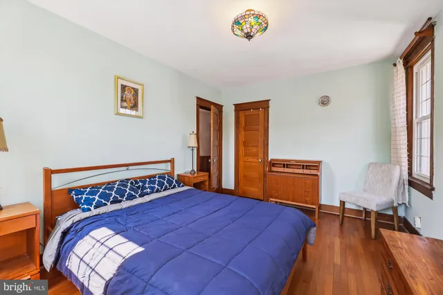 a view of a livingroom with furniture and a window