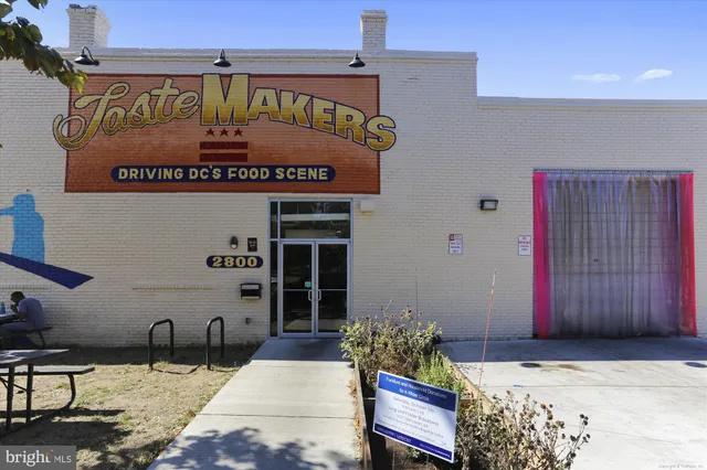 a view of a building with a street