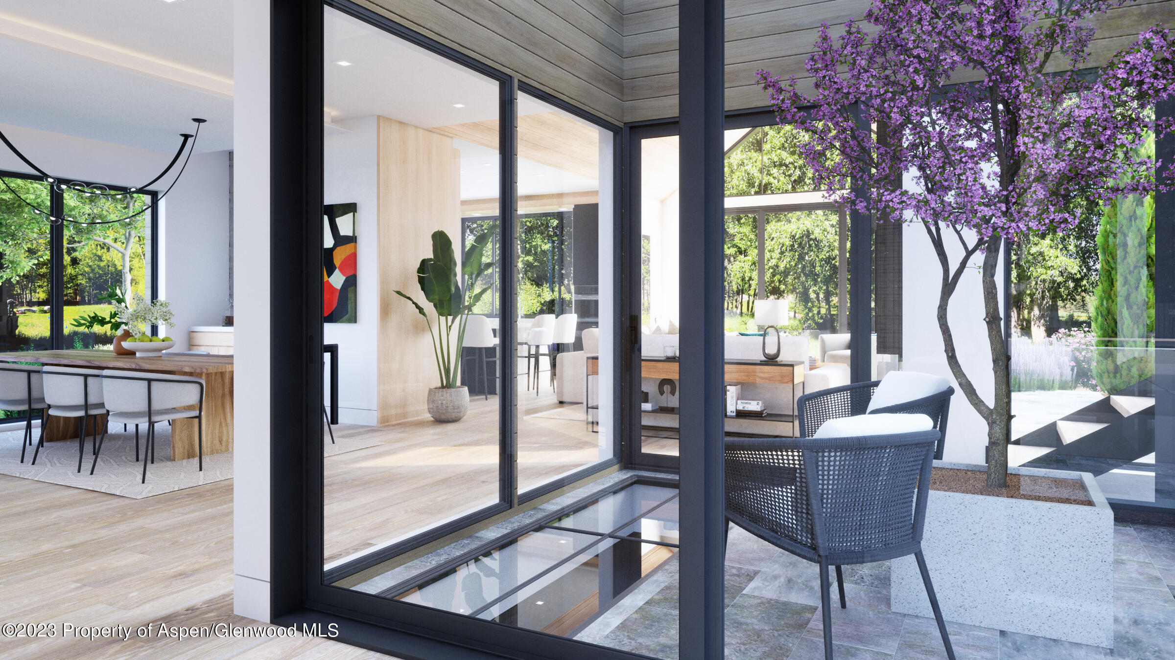 767 Cemetery Lane Aspen, CO 81611 - Photo 13 of 23 a dining room with furniture water view and a floor to ceiling window