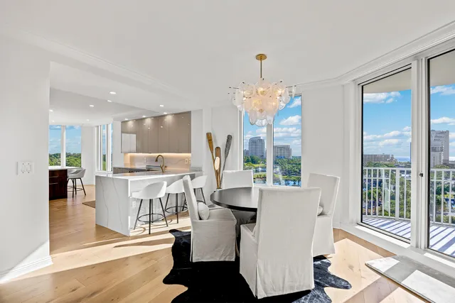 a large kitchen with a large counter top appliances and cabinets