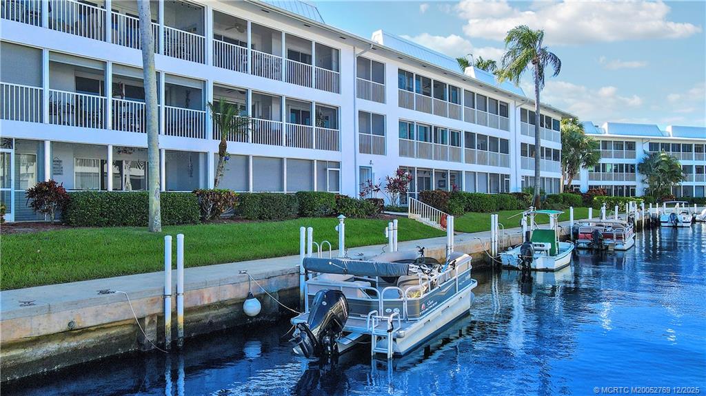 1864 Southwest Palm City Road, Unit 204 Stuart, FL 34994 - Photo 21 of 42 LOOKING WEST DOWN THE CANAL