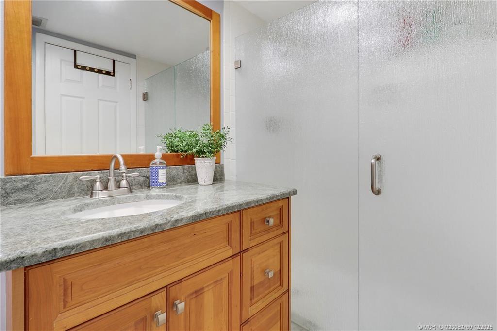 1864 Southwest Palm City Road, Unit 204 Stuart, FL 34994 - Photo 37 of 42 BEAUTIFULLY REMODELED GUEST BATH