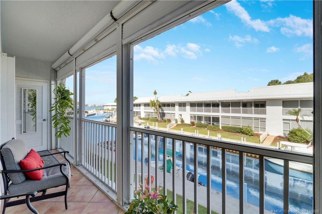 1864 Southwest Palm City Road, Unit 204 Stuart, FL 34994 - Photo 4 of 42 25' LONG SCREENED LANAI