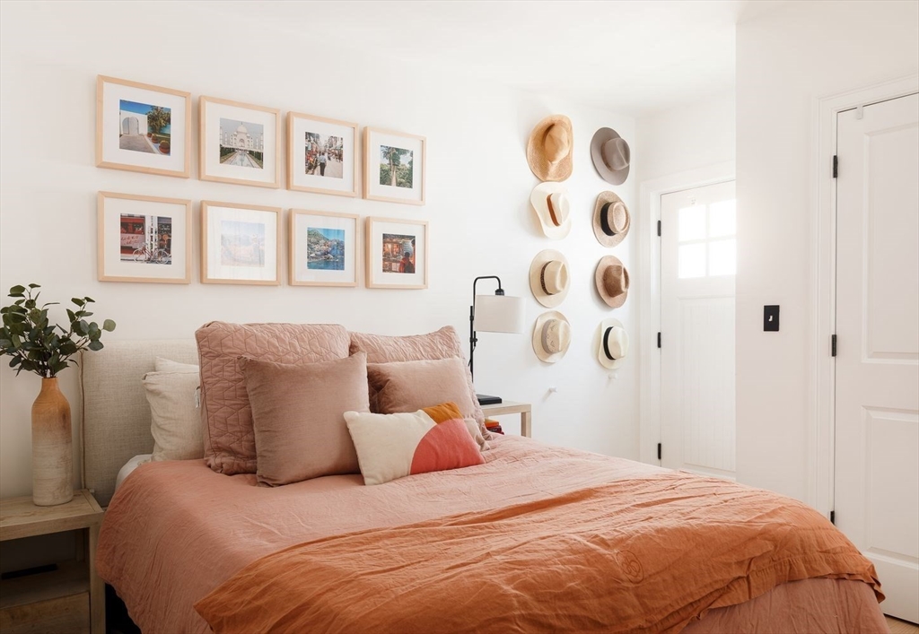 20 Mystic Street, Unit 2 Boston, MA 02129 - Photo 10 of 15 a bedroom with a bed and a potted plant