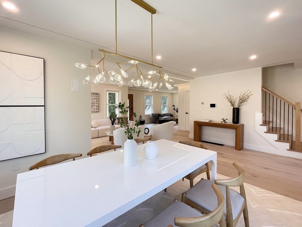 17 Gayland Road Needham, MA 02492 - Photo 14 of 33 a large kitchen with a table and chairs