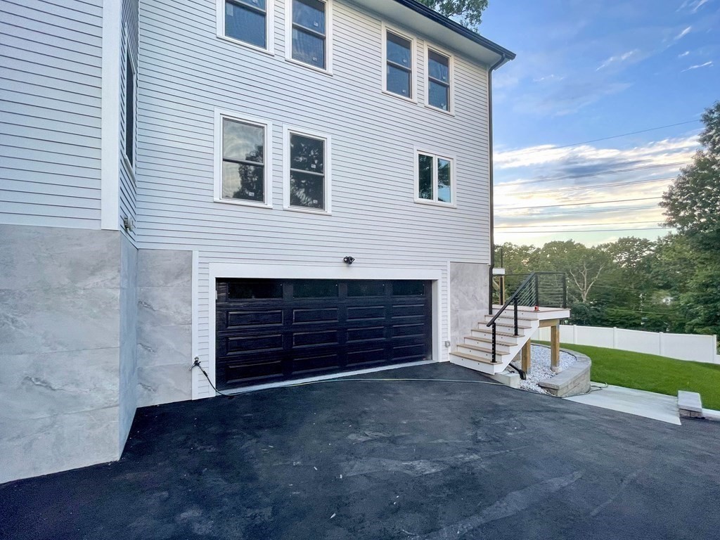 17 Gayland Road Needham, MA 02492 - Photo 29 of 33 a view of a house with a yard and sitting area