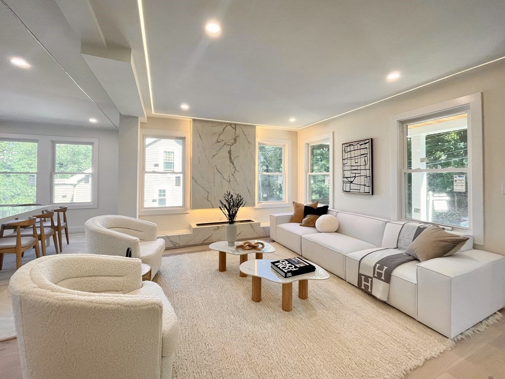 17 Gayland Road Needham, MA 02492 - Photo 3 of 33 a living room with furniture and a large window