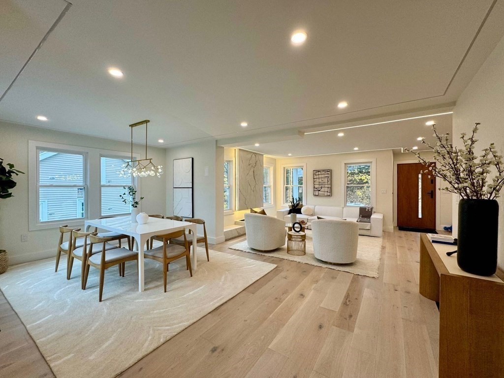 17 Gayland Road Needham, MA 02492 - Photo 33 of 33 a dining room with furniture a chandelier and kitchen view