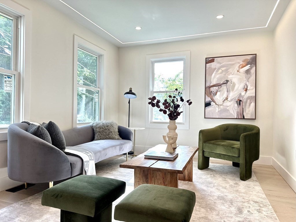 17 Gayland Road Needham, MA 02492 - Photo 4 of 33 a living room with furniture and a large window