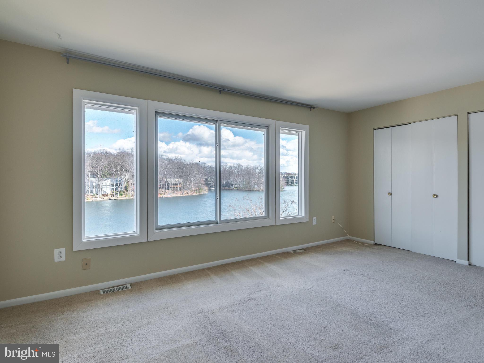 2017 Chadds Ford Drive Reston, VA 20191 - Photo 15 of 32 Primary bedroom has gorgeous views of the lake