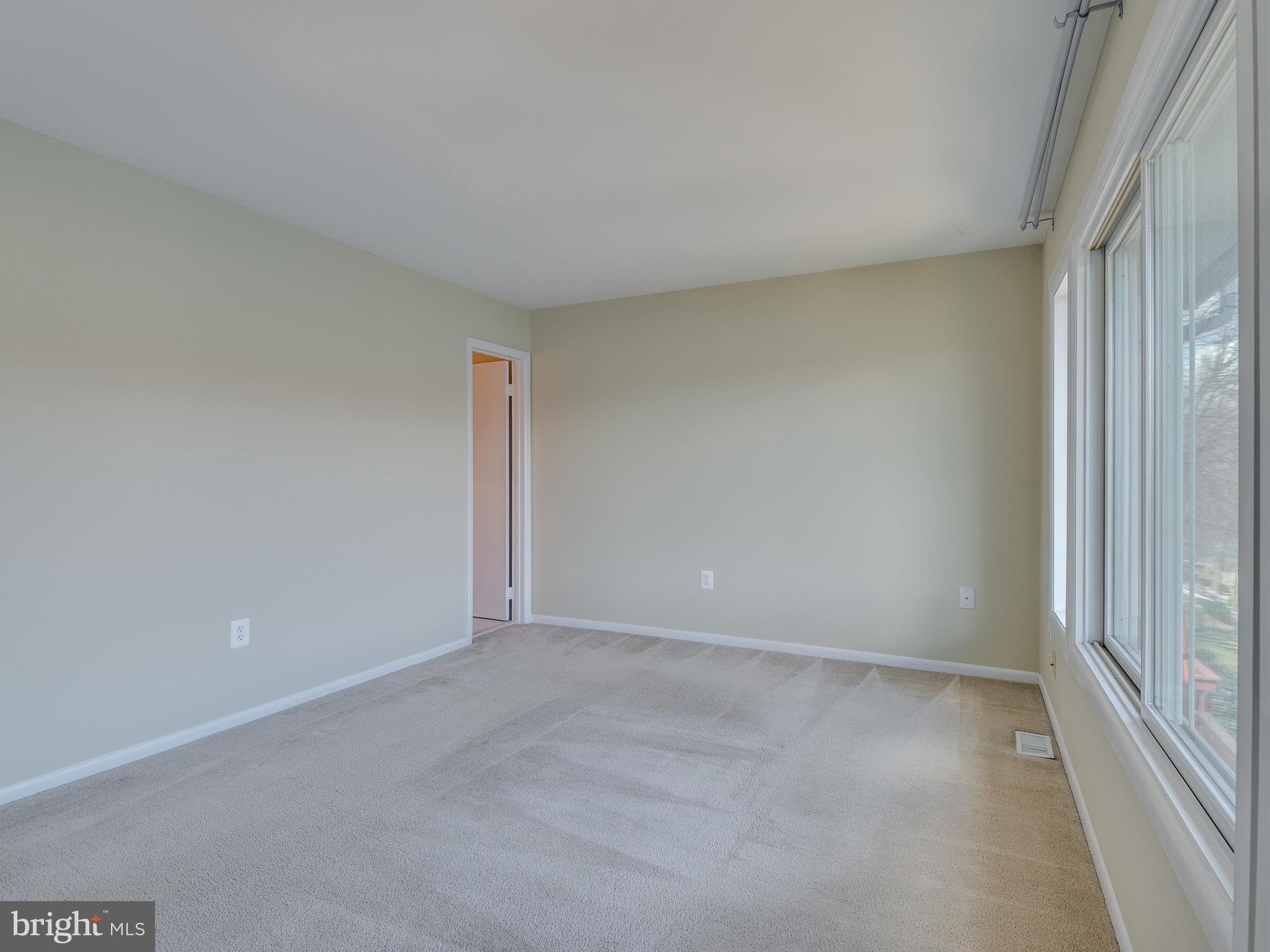 2017 Chadds Ford Drive Reston, VA 20191 - Photo 17 of 32 Large primary bedroom with ensuite