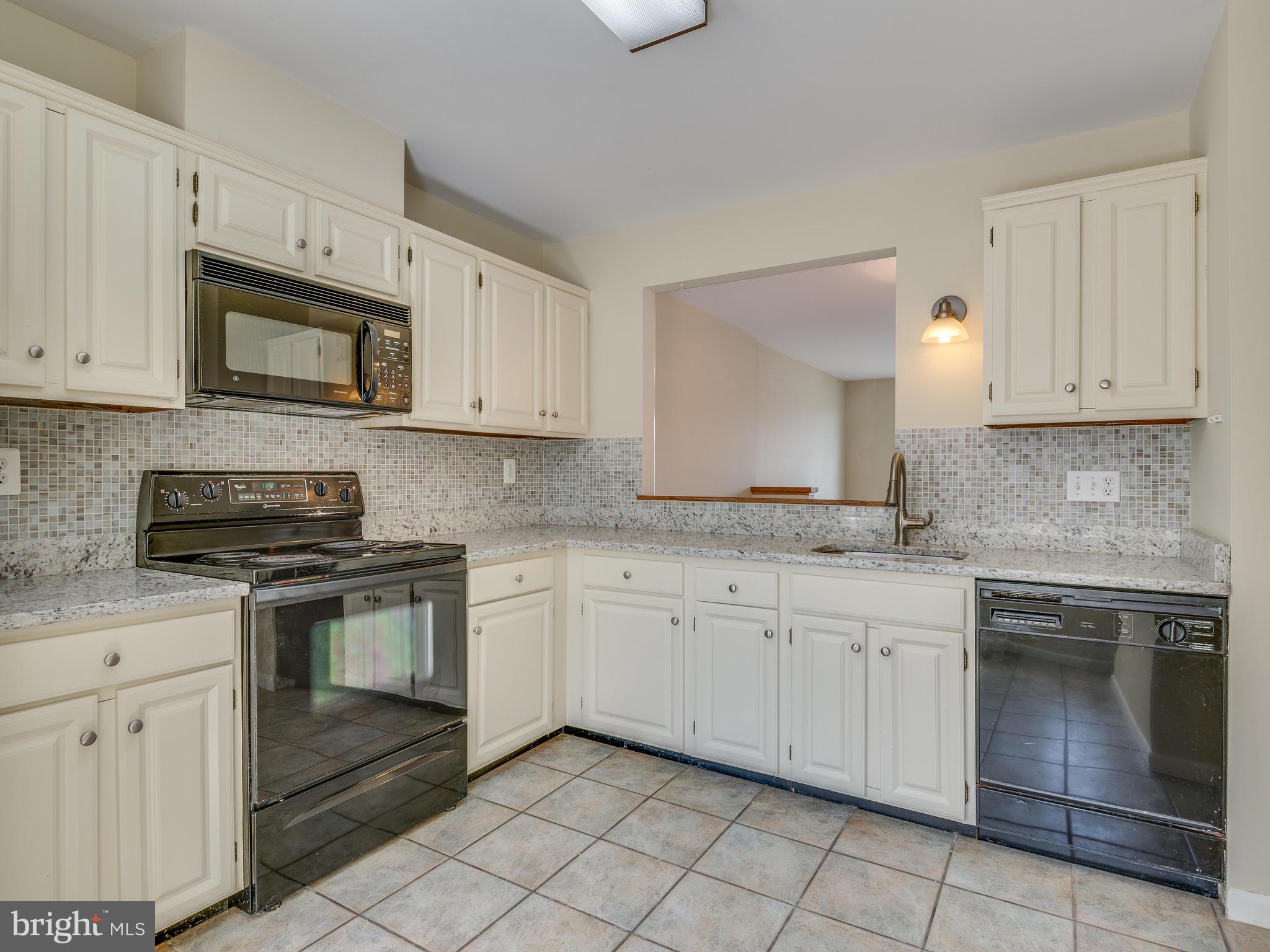 2017 Chadds Ford Drive Reston, VA 20191 - Photo 4 of 32 Pass through between kitchen and dining rooms