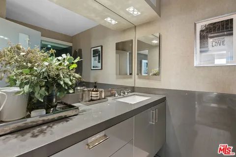 a bathroom with a bathtub a toilet and a shower