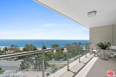 a view of a balcony and an ocean view