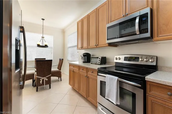 $7,000 | 10295 Heritage Bay Boulevard, Unit 911, Naples, FL 34120