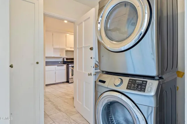 a view of a storage & utility room with washer and dryer