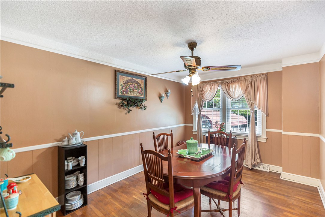 219 Beaty Square Anderson, SC 29624 - Photo 7 of 32 This inviting dining area features warm tones, beautiful wood flooring, and ample natural light for delightful gatherings.
