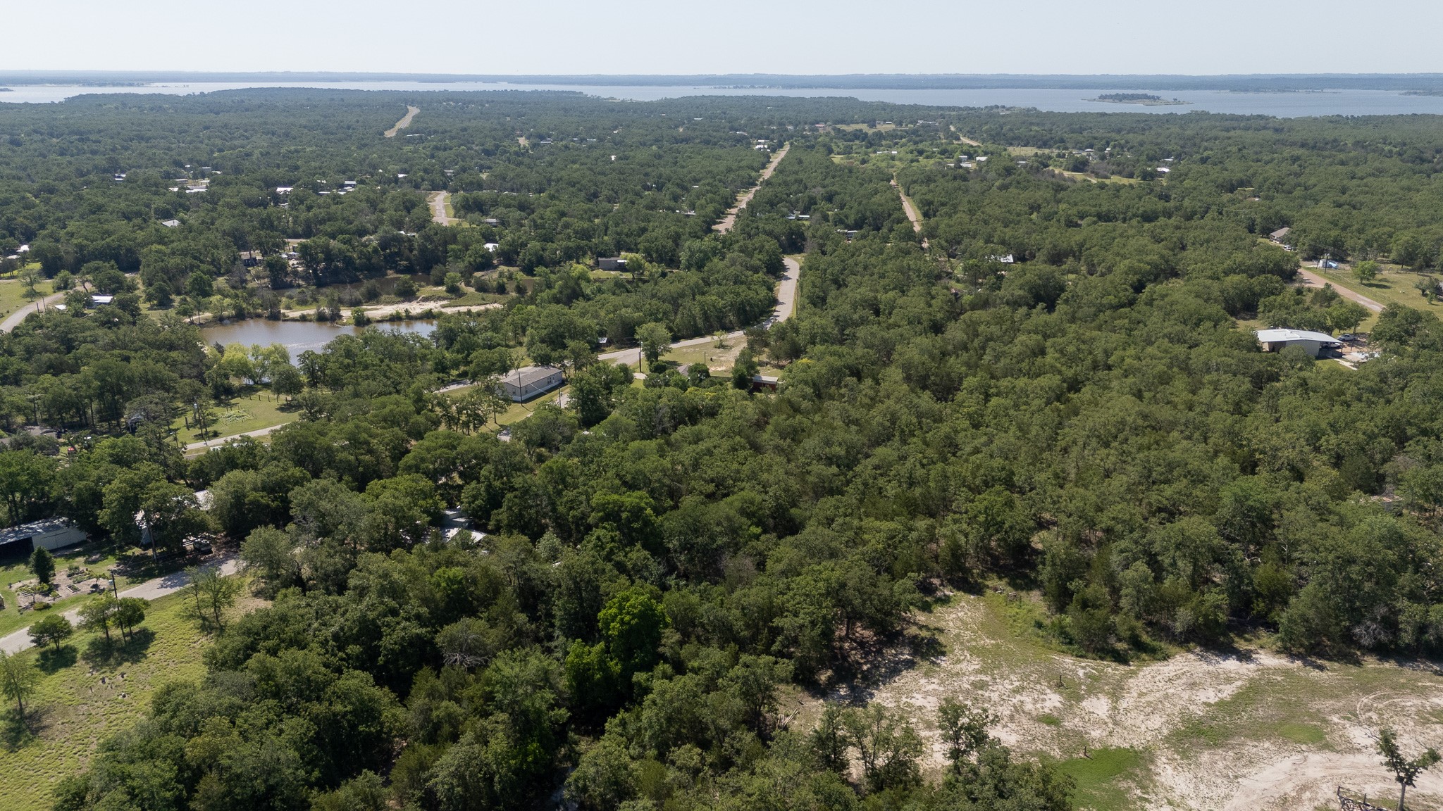 TBD Hill Loop Road Somerville, TX 77879 - Photo 2 of 13 a view of a city with green mountains