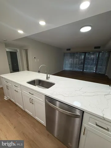 a kitchen with a stove and a microwave