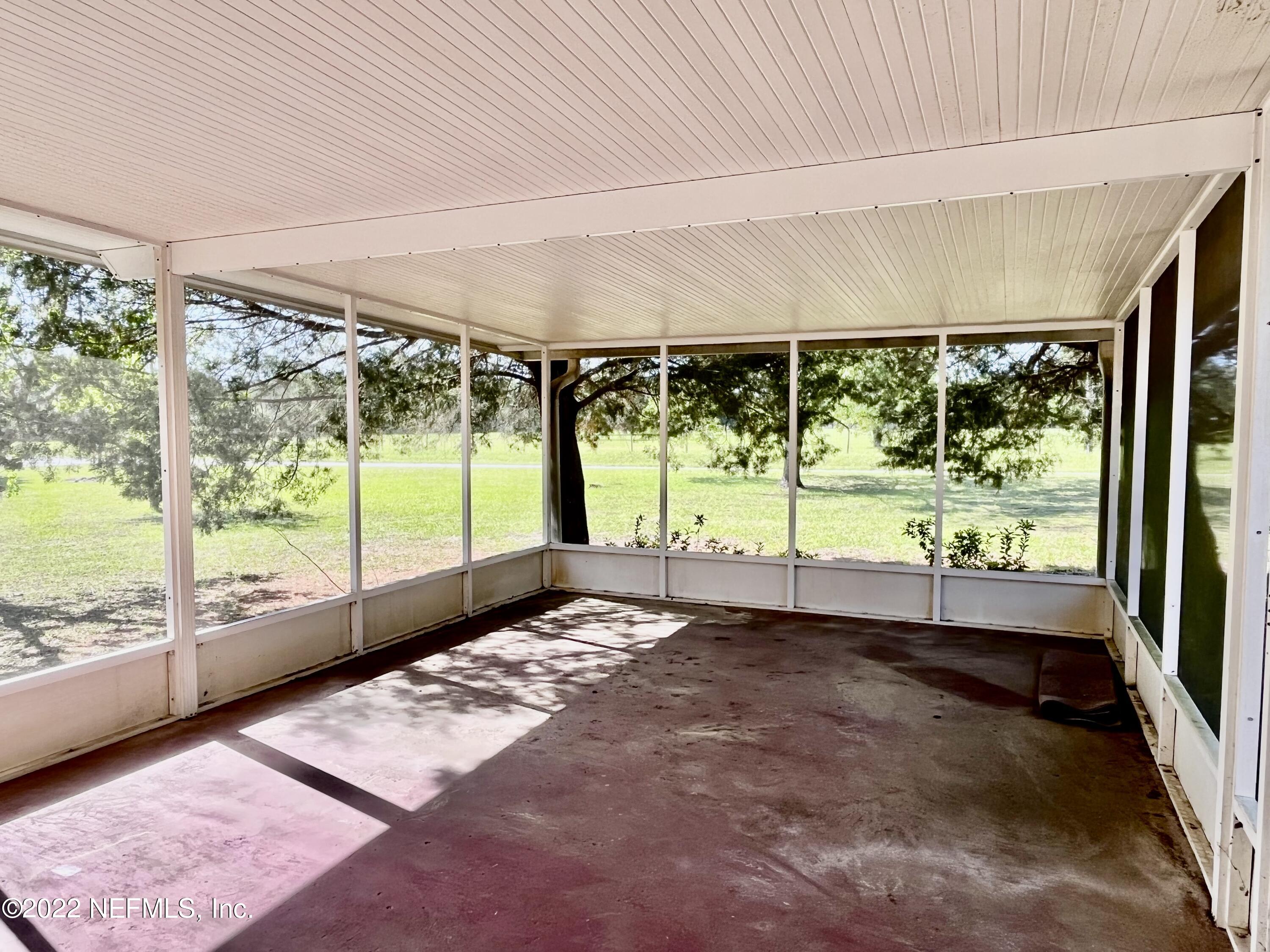 400 East Bannerville Road Palatka, FL 32177 - Photo 18 of 23 Screened front porch