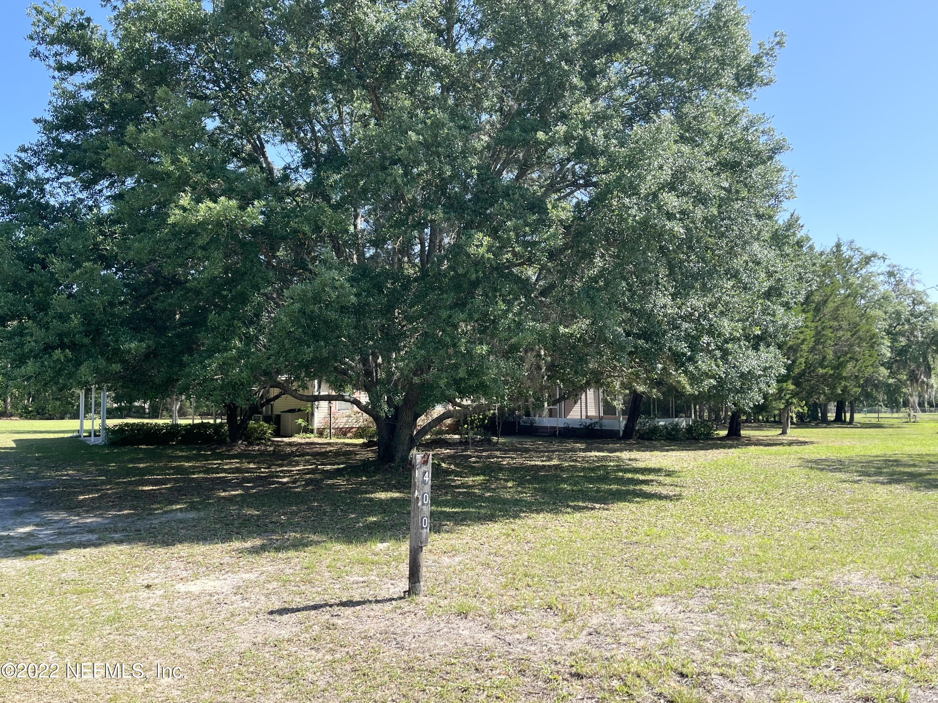 400 East Bannerville Road Palatka, FL 32177 - Photo 19 of 23 Beautiful oak tree in front yard!