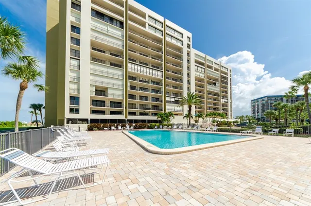 a view of building with swimming pool