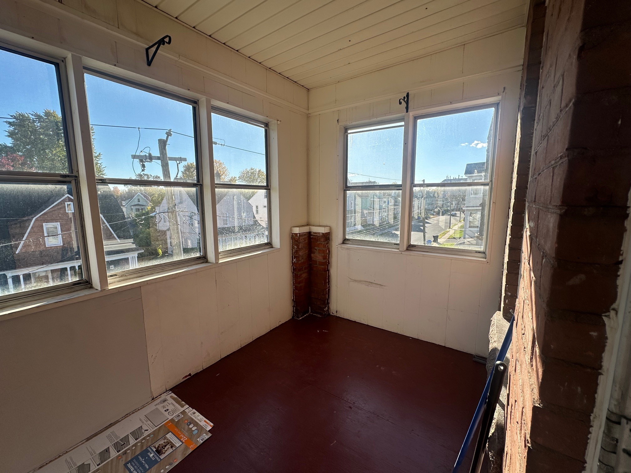 176 Adelaide Street, Unit 3 Hartford, CT 06114 - Photo 5 of 8 a view of an empty room with wooden floor and a window