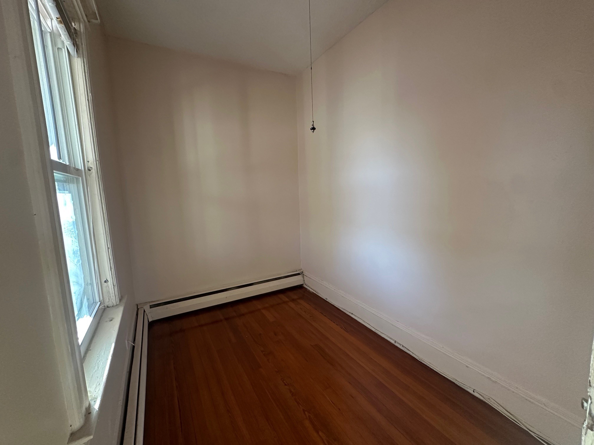 176 Adelaide Street, Unit 3 Hartford, CT 06114 - Photo 6 of 8 an empty room with windows