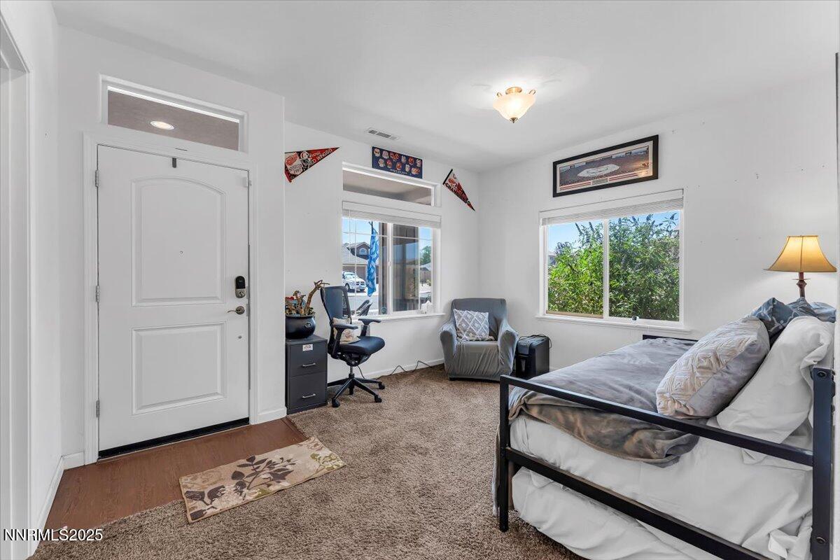 1178 Jasmine Lane Fernley, NV 89408 - Photo 3 of 65 a living room with furniture and a window
