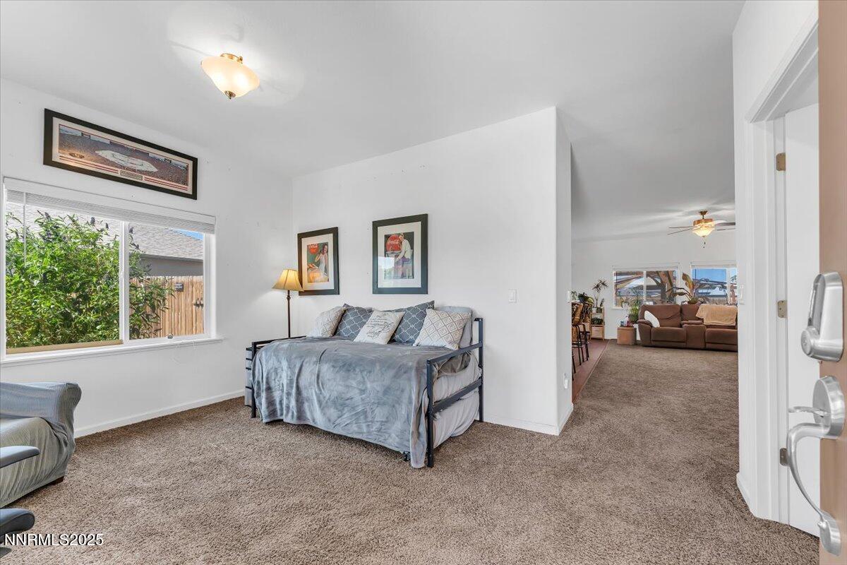 1178 Jasmine Lane Fernley, NV 89408 - Photo 4 of 65 a living room with furniture and a window