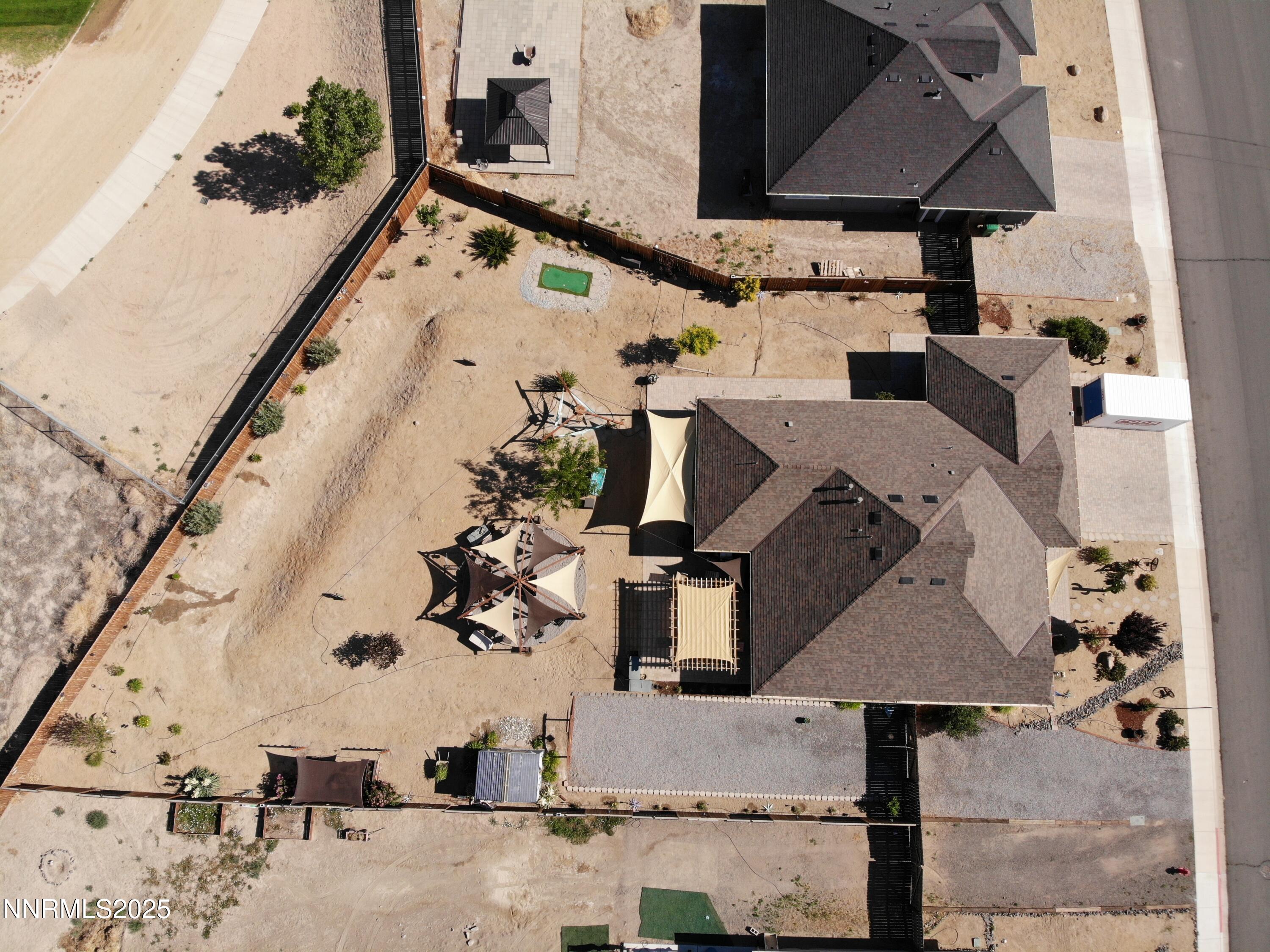 1178 Jasmine Lane Fernley, NV 89408 - Photo 50 of 65 an aerial view of a house with a yard