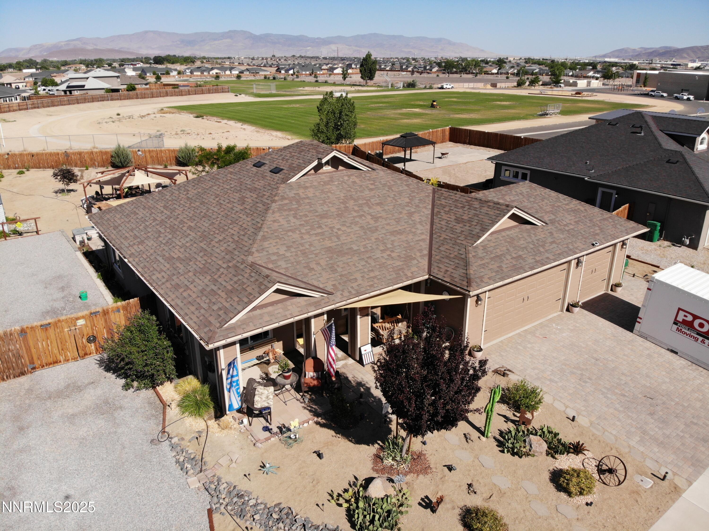 1178 Jasmine Lane Fernley, NV 89408 - Photo 54 of 65 an aerial view of a house with outdoor space and ocean view
