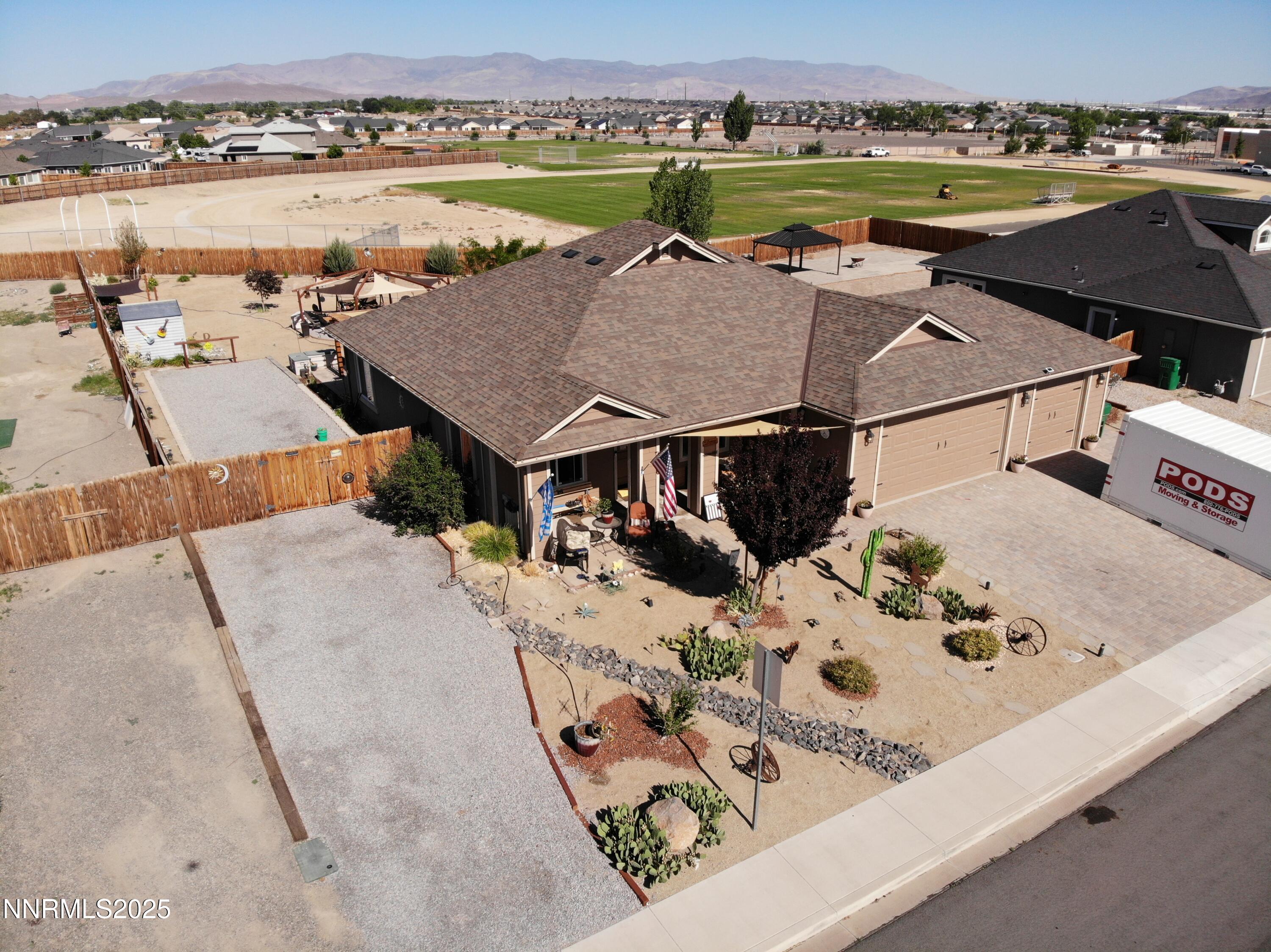 1178 Jasmine Lane Fernley, NV 89408 - Photo 55 of 65 an aerial view of a house with pool table and chairs