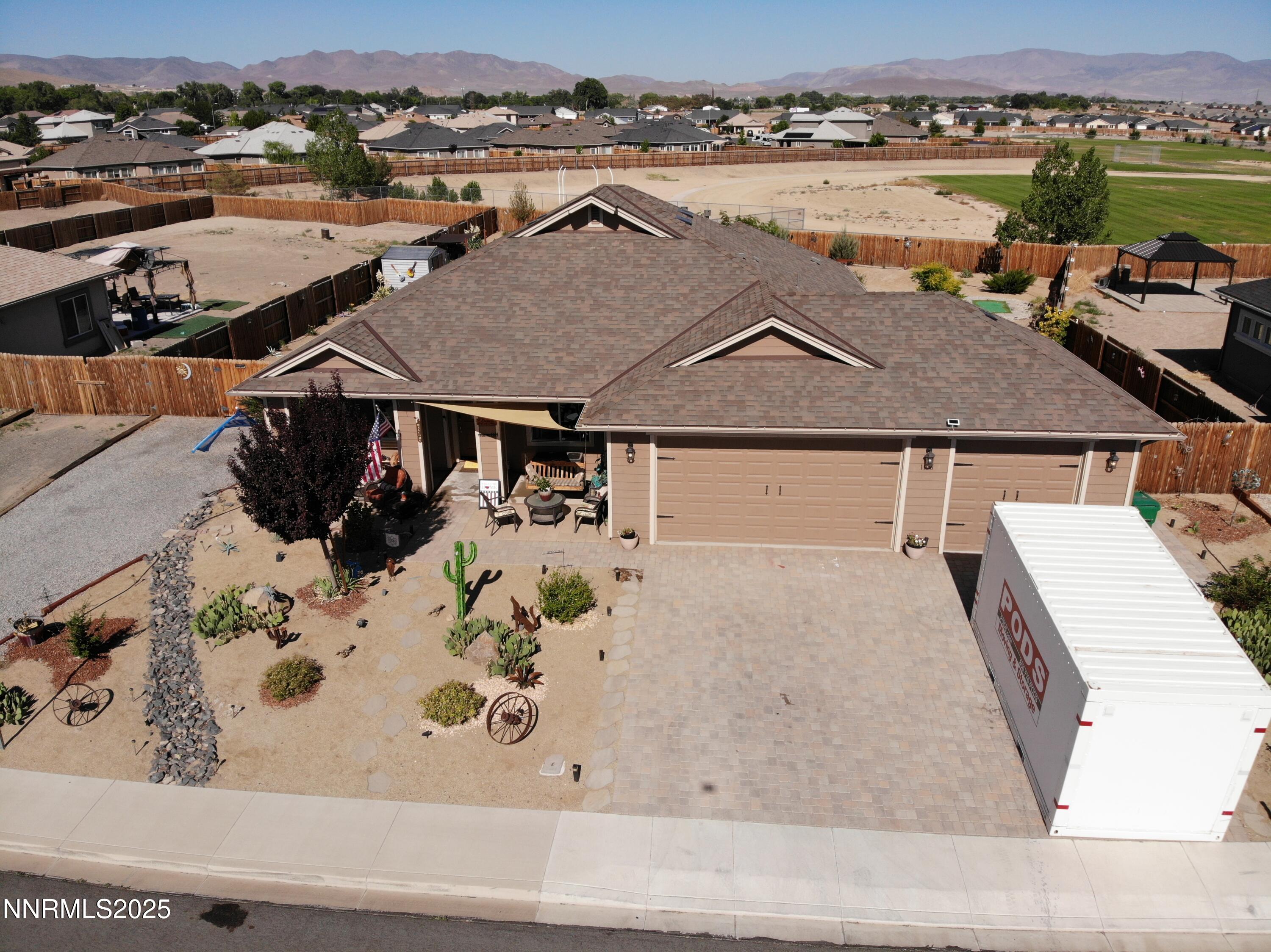 1178 Jasmine Lane Fernley, NV 89408 - Photo 58 of 65 an aerial view of a house with yard swimming pool and ocean view