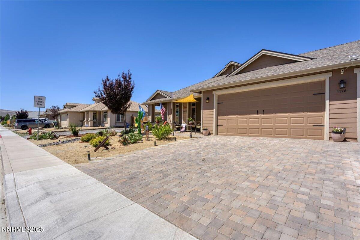 1178 Jasmine Lane Fernley, NV 89408 - Photo 61 of 65 a view of a house with outdoor space and porch