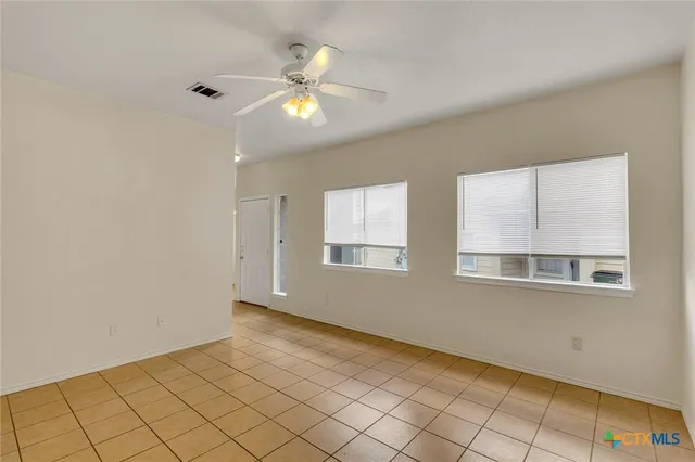 a view of an empty room with window