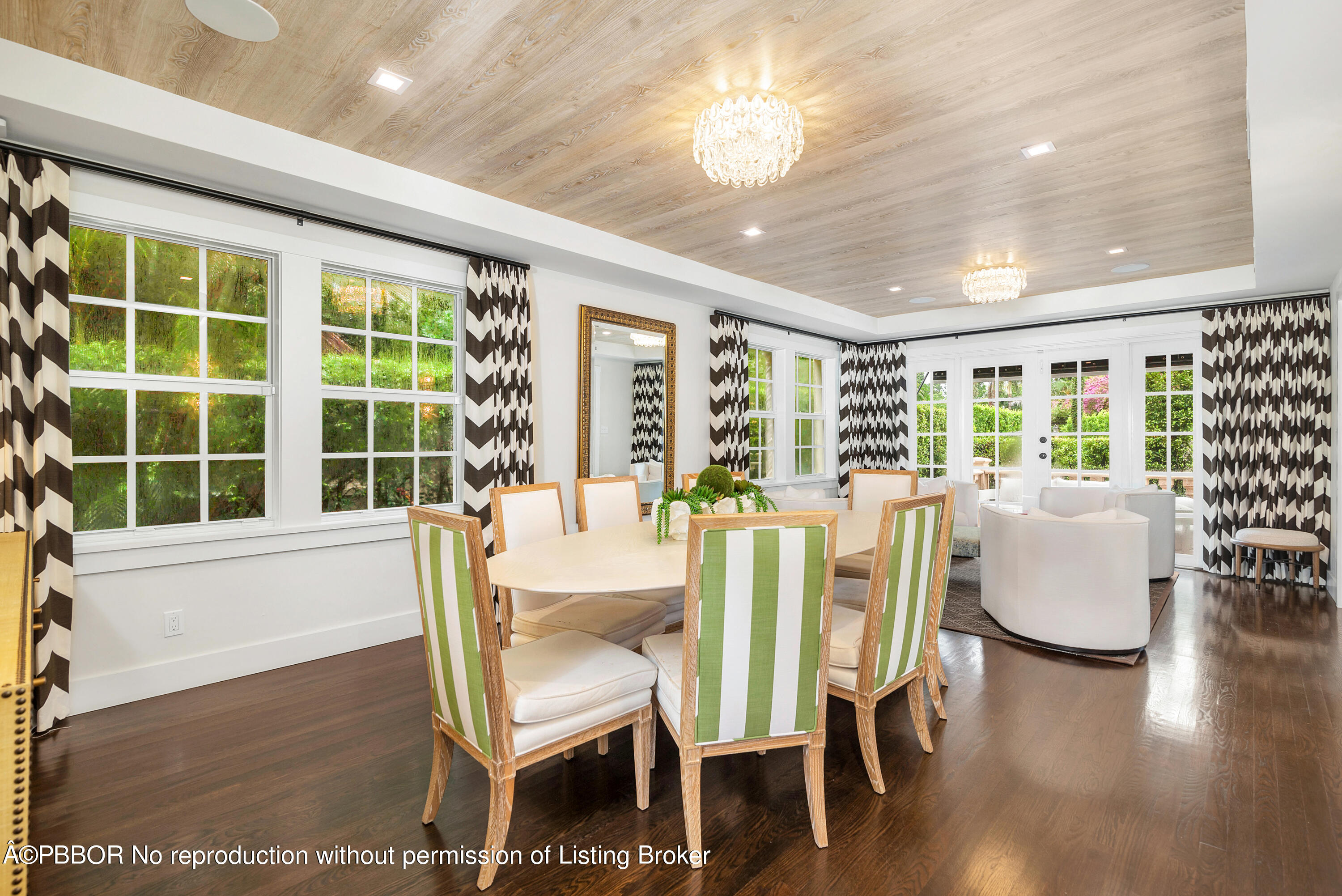 231 Sunset Road West Palm Beach, FL 33401 - Photo 6 of 22 a dining room with furniture window and wooden floor